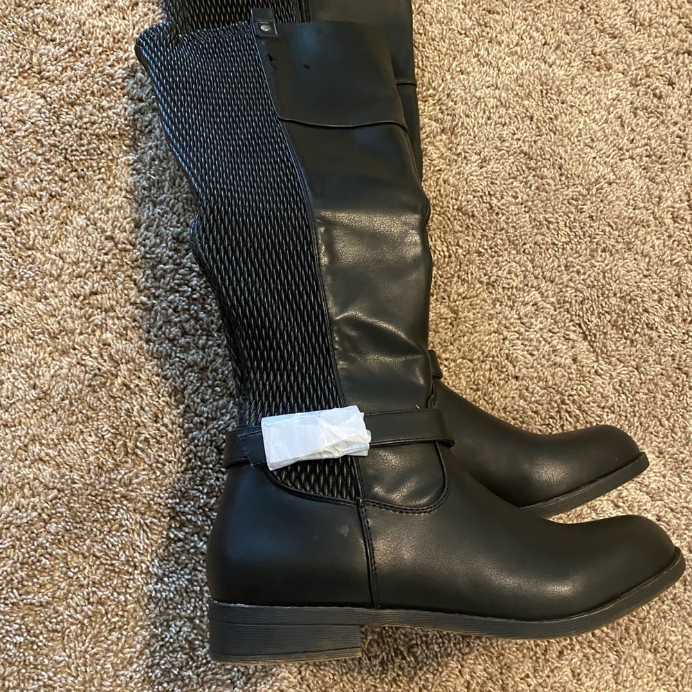 Knee high boots. Ladies knee-high boots